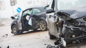 car crash accident on street, damaged automobiles after collision in city