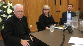 (L to R): Bishop Earl Boyea; assault survivor and counselor Eileen Craig; and Diocese of Lansing General Counsel Will Bloomfield.