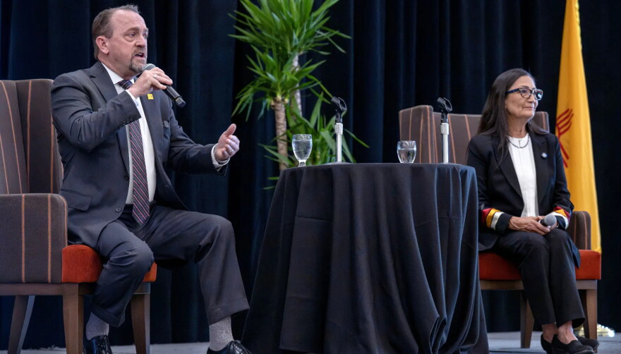 Republican gubernatorial candidate Gregg Hull, left, speaks last week during a candidate forum at the Albuquerque Convention Center, as his Democratic opponent Deb Haaland looks on. The two candidates are vying this fall to succeed outgoing Gov. Michelle Lujan Grisham.