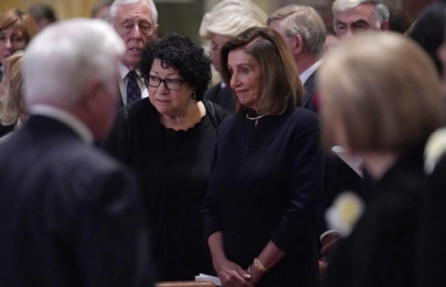 Supreme Court Justice Sonia Sotomayor, left and House Speaker Nancy Pelosi arrive for the funeral mass.