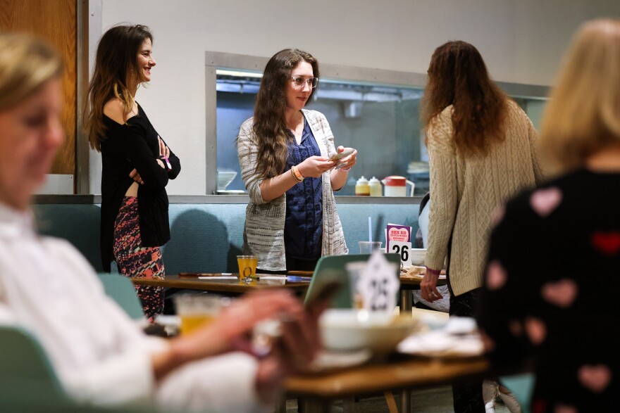 Participants decide on answers during Sex Ed Trivia Night on Thursday, Feb. 8, 2024, at Hello Dumpling in Dallas. The event benefits Wholly Informed Sex Ed, a nonprofit that advocates for comprehensive, medically accurate sex education.
