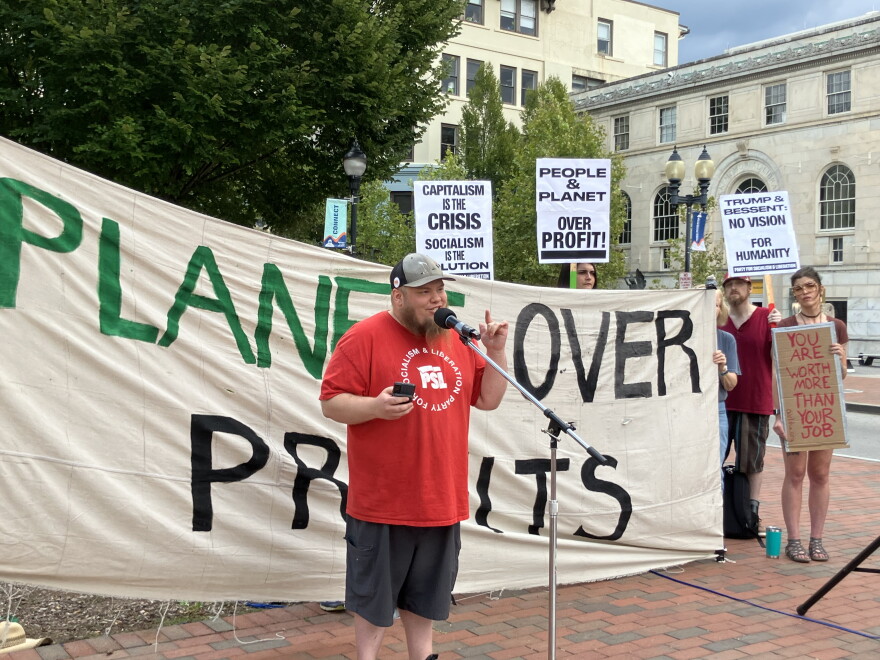 Cody Cogdell, an organizer with the Party for Socialism and Liberation, speaks during a demonstration in Asheville's Pack Square Friday, August 28, 2026.