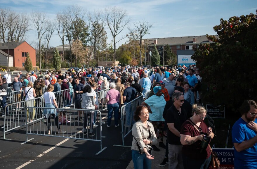 People wait in line at the early voting site Oct. 29, 2024, at St. Luke’s United Methodist Church in Indianapolis.
