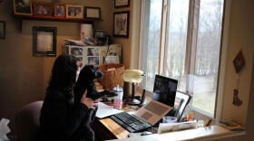Fayetteville-Manlius teacher Beck Stephens during a virtual lunch hour. She’s holding up her dog, Lokie, to her students. BECK STEPHENS
