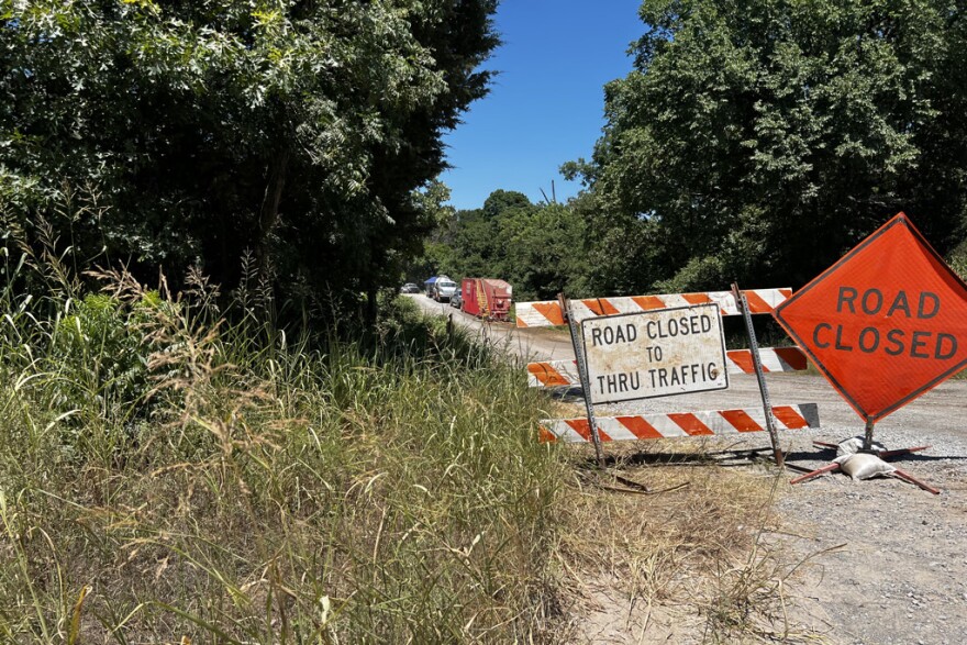 A road closure at N3520 Road and East Fairlawn Road near the reported site of the spill in Cushing.