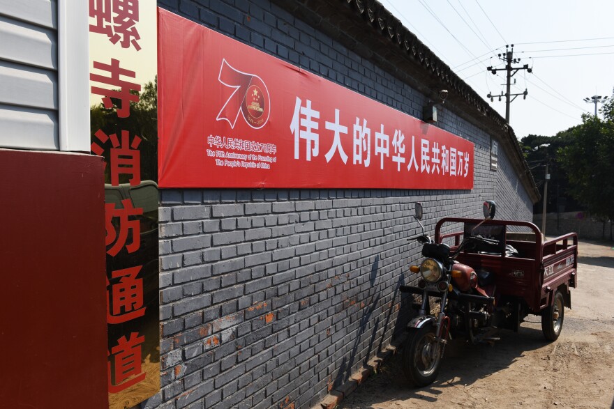 Banners, signs and giant floral arrangements have gone up all over Beijing to celebrate the 70th anniversary of the founding of modern China.