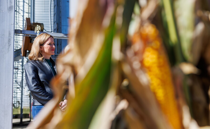 Secretary of State Jocelyn Benson, the Democratic nominee for governor, stands with corn growers during a news conference at Shady Lodge Farm in Lansing, Mich., on Oct. 8, 2026.