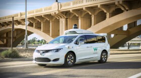 This undated photo provided by Waymo shows its self-driving minivan. Google's self-driving car spinoff is finally ready to try to profit from its nearly decade-old technology. Waymo introduced a small-scale ride-hailing service in the Phoenix area Wednesday, Dec. 4, 2018, that will include a human behind the wheel in case the robotic vehicles malfunction. (Waymo via AP)