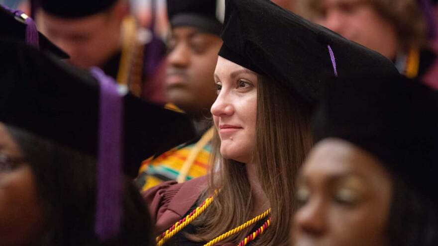 Graduates pictured seated during ceremony.