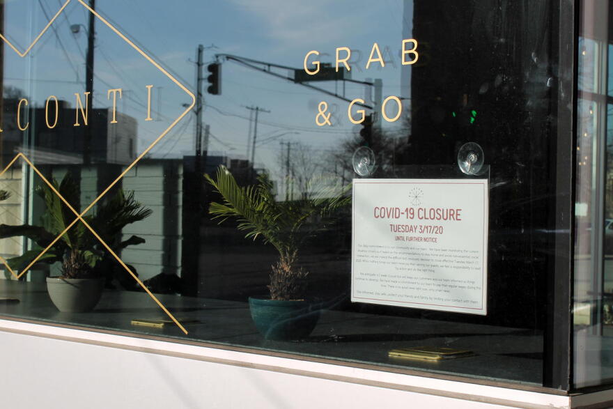 Bovaconti, a coffee shop in Indianapolis, lets customers know it is closed until further notice.