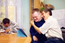 Pictured here are three adults with disabilities who look like they're having fun.