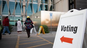 Voters enter Burton Barr Central Library to cast their ballots in Phoenix, Arizona.