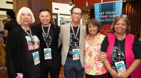 Attendees at the Las Vegas Filipino Short Film Festival smile at the camera.