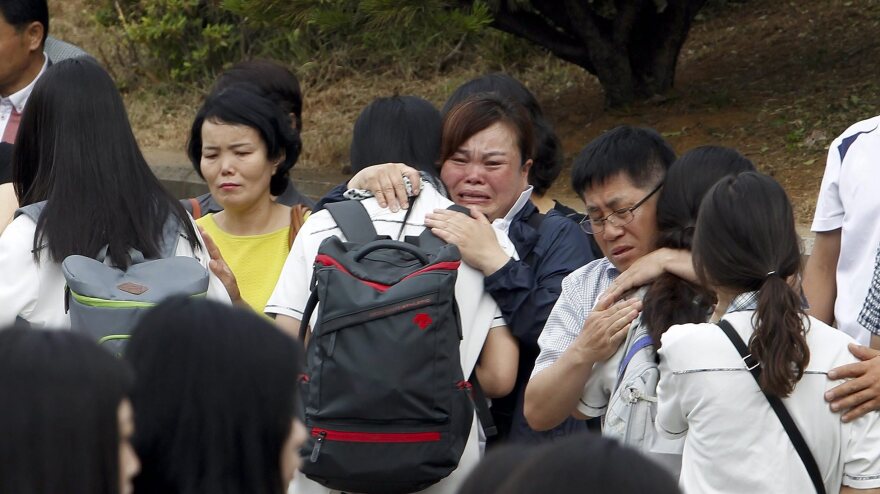 More than 70 second-year students who survived the sinking of the ferry Sewol returned to Danwon High School in Ansan, South Korea, on Wednesday.