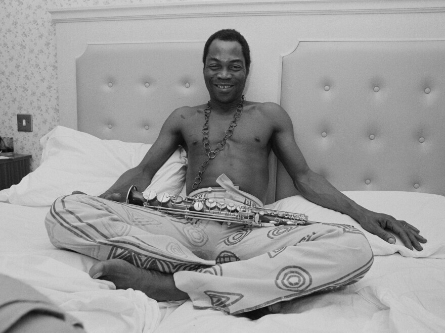 Nigerian multi-instrumentalist, musician, composer, and pioneer of the Afrobeat music genre Fela Kuti (1938 - 1997) in an hotel room, UK, 6th January 1984. (Photo by Mike Moore/Daily Express/Hulton Archive/Getty Images)