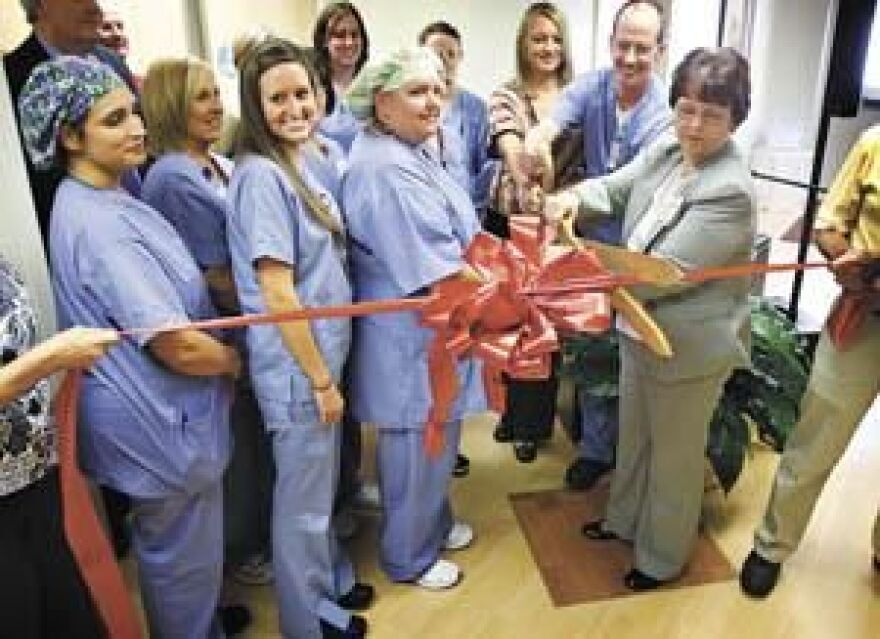 Clara Sumner (far right) of Bowling Green, chief executive officer of The Medical Center at Franklin, along with members of the surgery staff, participate in a ribbon-cutting ceremony Monday for a surgery expansion project at the hospital.