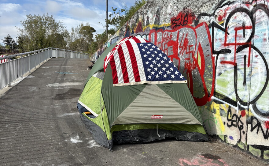 A tent in a homeless encampment next to Oakland's Lake Merritt Estuary in April, 2025.