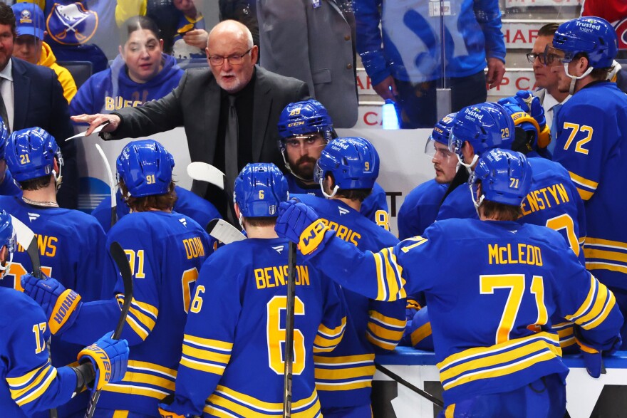 Buffalo Sabres head coach Lindy Ruff speaks with team during the third period in Game 1 of a second-round NHL hockey Stanley Cup playoff series against the Montreal Canadiens Wednesday, May 6, 2026, in Buffalo.