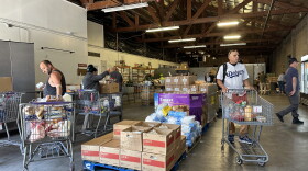 Locals “shopping” at Catholic Charities’ downtown location on Wednesday, Sept. 23.