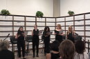 Actors read Sheri Wilner-Deering’s “The Does” in June of 2026 presented at the Donald J. Trump–Jeffrey Epstein Memorial Reading Room in Washington, D.C., a temporary installation of bound volumes of Epstein-related records. A Miami cast will present a staged reading at the Unitarian Universalist Congregation of Miami on Sunday, Oct. 4.