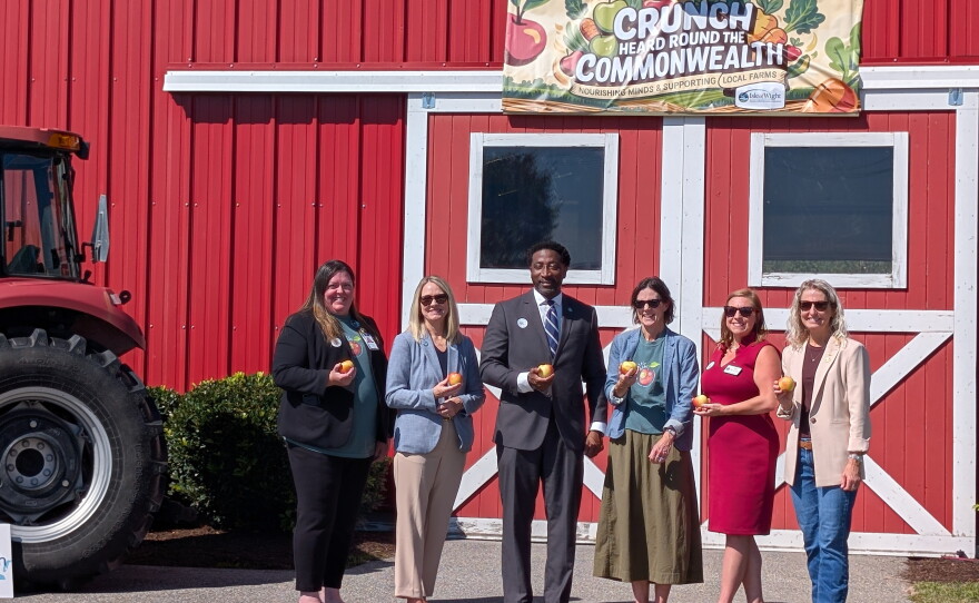 State and local officials join Isle of Wight Superintendent Dr. Christopher Coleman (center) at the Crunch Heard 'Round the Commonwealth event.