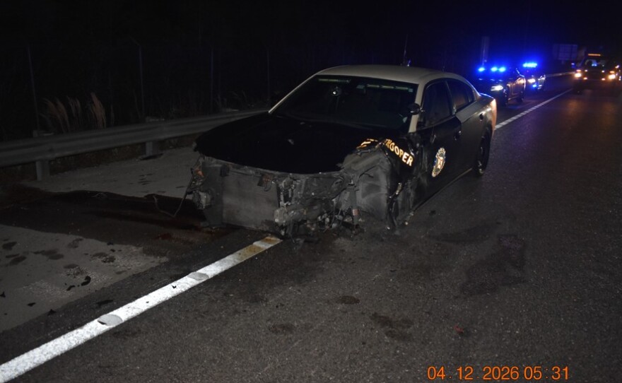 A Florida Highway Patrol trooper was seriously injured by debris after another driver hit his parked patrol vehicle along I-75 Sunday morning. The driver, Jonathan Munas, 32, of Sarasota, was charged with driving under the influence.