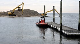 Excavators begin removing a sandbar impeding access to the Southport Harbor. The U.S. Army Corps of Engineers is set to remove the sandbar using a dredging vessel. The project has been delayed for months due to demand for similar projects in other states January 13, 2025