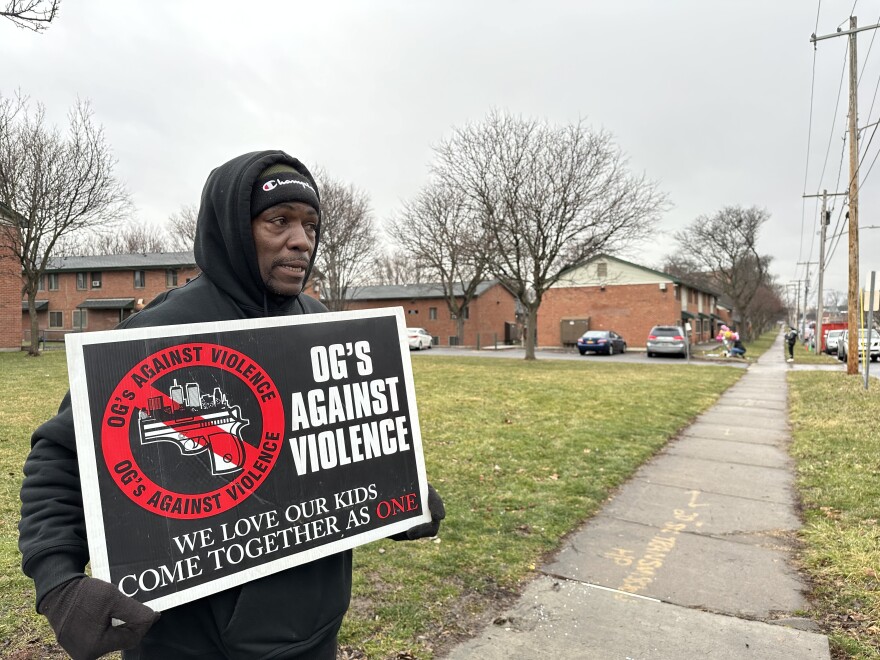  Tyrone Mulligan of the group OG's Against Violence, stands near where 11-year-old Brexialee Torres-Ortiz was killed Monday night in a drive-by shooting