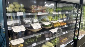 Fresh produce lines the shelves at FoodChain's Neighborhood Green Grocery on July 17, 2026. Some of it comes from the nonprofit's aquaponics farm, housed in the same building.