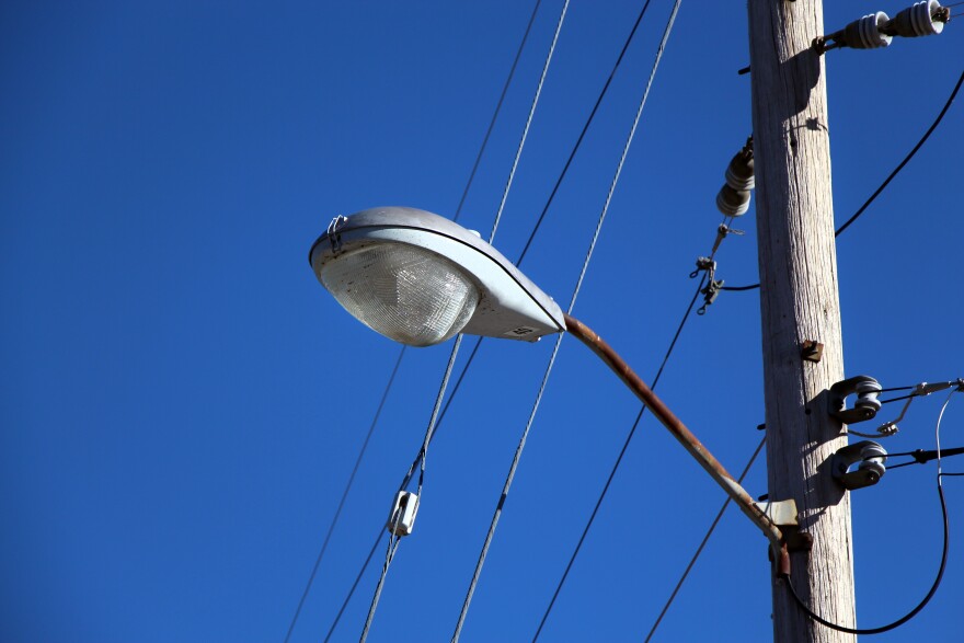 This is an example of one of the street lights at Thousand Hills State Park that remains noncompliant with DarkSky requirements. This kind of light causes avoidable glare and light pollution because the bulging shape doesn’t fully focus light onto the ground.
