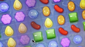 This Monday, March 24, 2014, file photo shows a detail from the online game "Candy Crush Saga" on a computer screen in New York. (Mark Lennihan/AP)