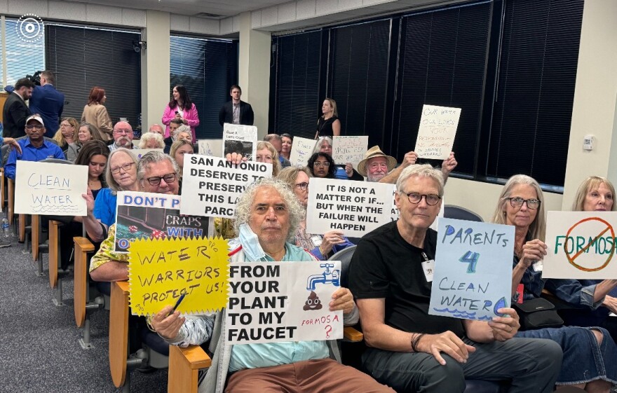 Opponents to the Guajolote subdivsion at a TCEQ hearing on October 22nd, 2025