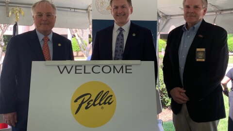 Former Reidsville Mayor Jay Donecker stands with Tony Copeland, the former Secretary of the NC Department of Commerce, and Timy Yaggi, the previous CEO of Pella Corporation in 2019.