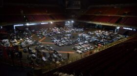 Residents seek shelter inside Roberto Clemente Coliseum in San Juan, Puerto Rico, early on Sept. 20, 2017, as Hurricane Maria passes the island. (Hector Retamal/AFP/Getty Images)