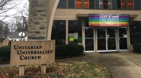 Two banners, complete with racial slurs and veiled threats against pop singer Jackson Browne, were found before Sunday's service.
