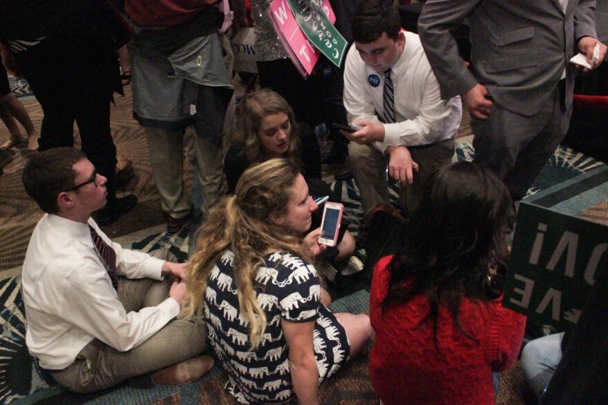 Republican supporters watch for results on Election Night.