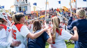 Syracuse celebrates after a 25-8 win over Johns Hopkins in the second round of the NCAA Tournament on May 14, 2023.