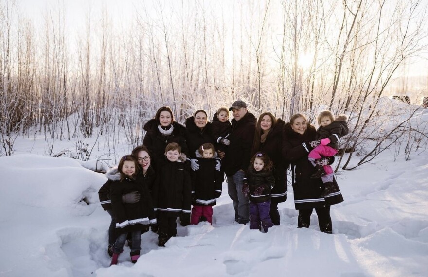 Cody Eyre's family at the location where he was fatally shot on Christmas Eve 2017.