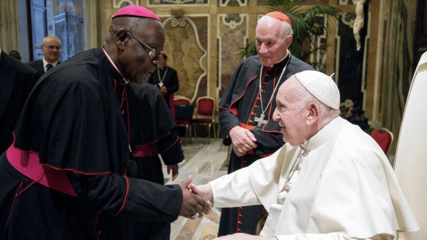 Pictured: Most Rev. Jerome Feudjio, Bishop of St. Thomas, Virgin Islands greets Pope Francis during a visit of the United States Bishops to Rome in 2022