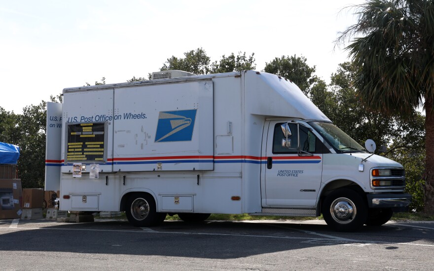 No matter what the weather is, USPS employees handle all postal services from this mobile truck unit in Cedar Key. (Mikayla Johnson/WUFT News)