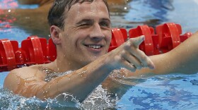 United States' Ryan Lochte reacts after finishing first in the men's 400-meter individual medley swimming final at the Aquatics Centre in the Olympic Park. Lochte won the first U.S. gold medal at the 2012 Summer Games.