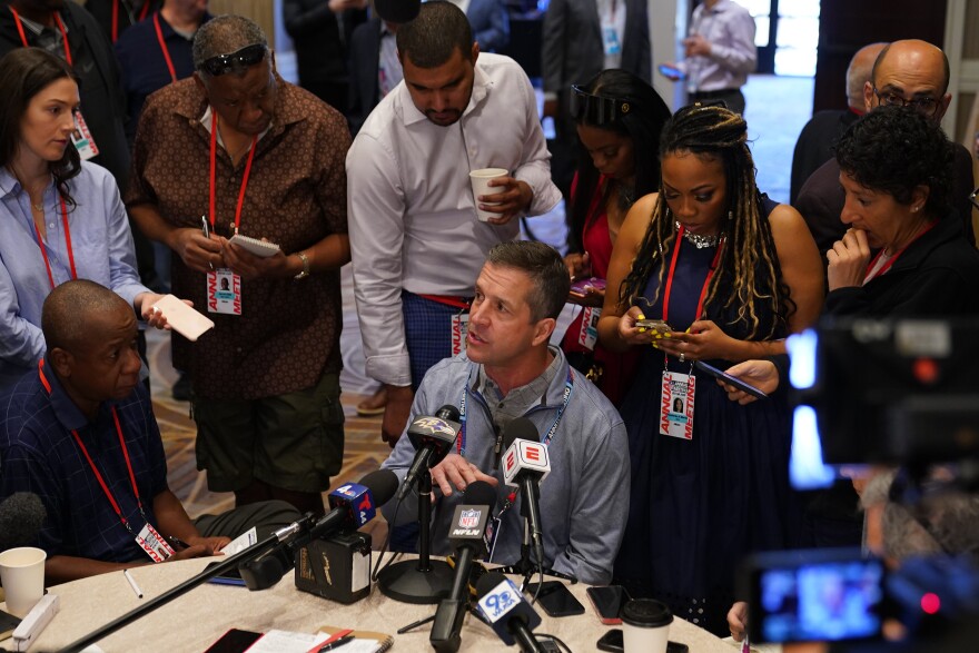 Baltimore Ravens head coach John Harbaugh speaks during the AFC head coaches availability at the NFL meetings, Monday, March 27, 2023, in Phoenix. (AP Photo/Matt York)