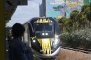 FILE - A Brightline train approaches the Fort Lauderdale station on Sept. 8, 2023, in Fort Lauderdale, Fla.