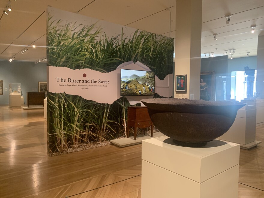 Kettles were used in sugar processing. Enslaved people worked under dangerous, harsh conditions to boil sugar syrup from one kettle to another.
