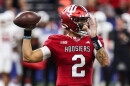 Indiana's Tayven Jackson throws downfield during Saturday's game against Louisville in Indianapolis.