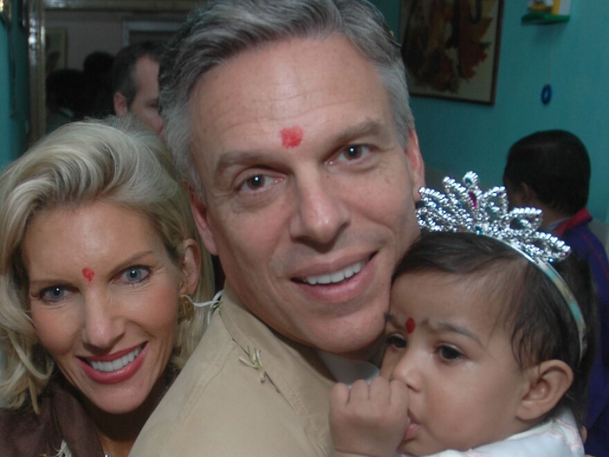 Jon Huntsman and his wife, Mary Kaye, with their adopted daughter, Asha Bharati, at Matruchhaya Orphanage in Nadiad, India, Dec. 19, 2006.