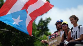 Demonstrators took to the streets Friday, a day after Puerto Rico Gov. Ricardo Rosselló announced he would resign. It is unclear who will take his place.