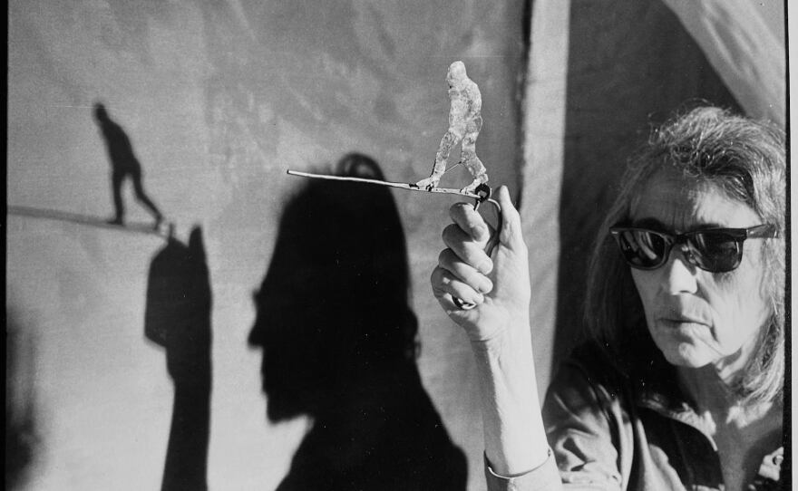 Undated photo of artist June Leaf at work.