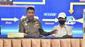Deputy National Police Chief Surachet Hakpal, left, talks to reporters with Tubtim "Sue" Howson, 57, during press conference at police headquarter in Bangkok, Thailand, Wednesday, Feb. 15, 2023. Howson allegedly struck Michigan State University student Benjamin Kable, 22, shortly before dawn on Jan. 1. She flew to Thailand on a one-way ticket on Jan. 3, according to U.S. authorities. (Royal Thai Police via AP)