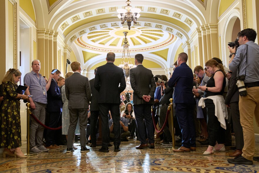 Senate Majority Leader John Thune, R-S.D., center left, speaks to reporters along with members of the Republican leadership, Tuesday, June 24, 2025, on Capitol Hill in Washington.